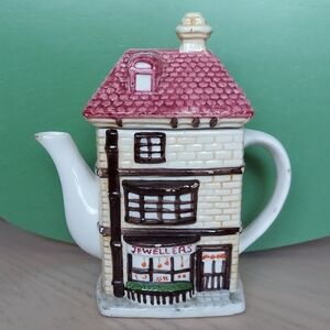 Charming House Teapot with Pink Roof